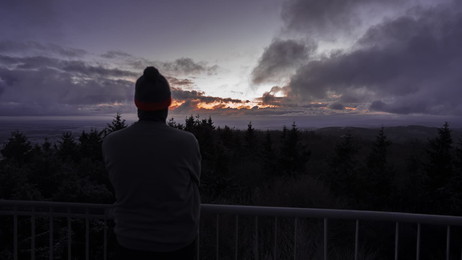 Szymon standing back and watching the sunrise